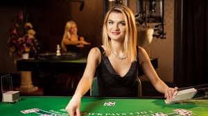Live baccarat and blackjack table games streamed on iq77 platform